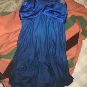 A short blue, sparkly dress